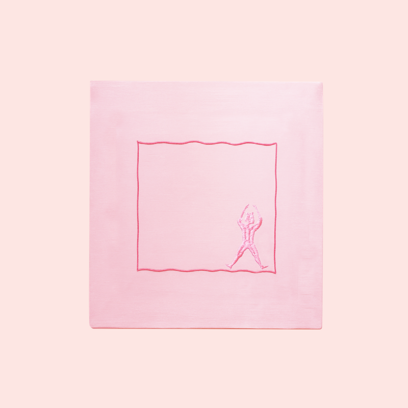 Load image into Gallery viewer, Pink fabric square with embroidered design on a pink background
