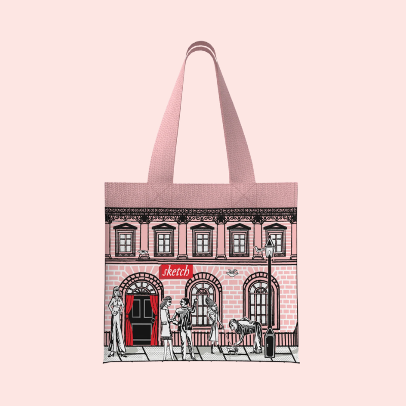 Load image into Gallery viewer, Tote bag with a design of a building and people on a pink background
